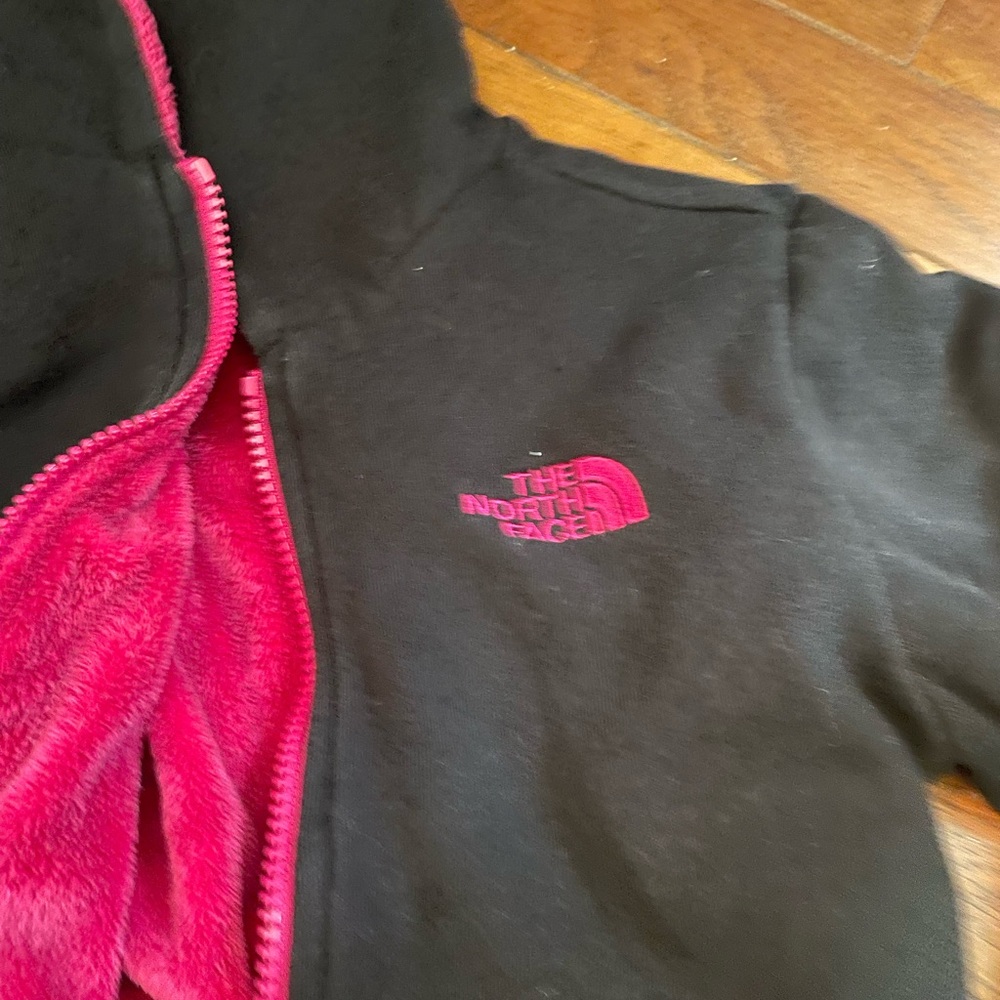 Girls, reversible, pink and black Northface hoodie. Very cute. Good condition.